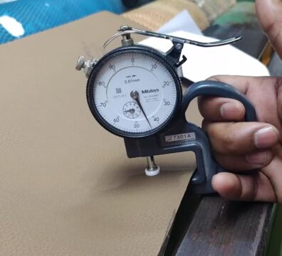 Measure the thickness of artificial leather using a professional thickness gauge.